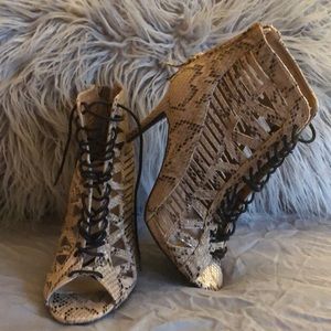 Lace up snake skin heels!